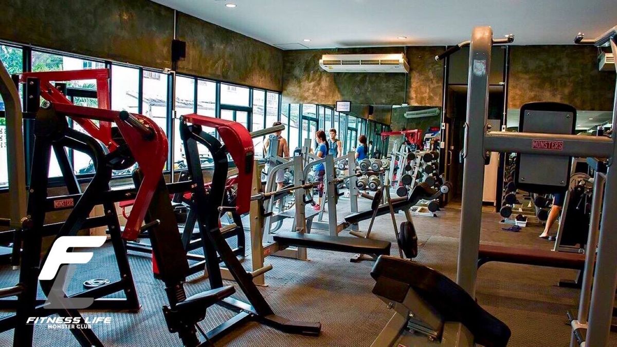 Weight machines and benches on the gym floor at Fitness Life On Nut